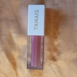 SWATCHED Tanais Sunset to Stars Lip Oil PLUMERIA PETALS